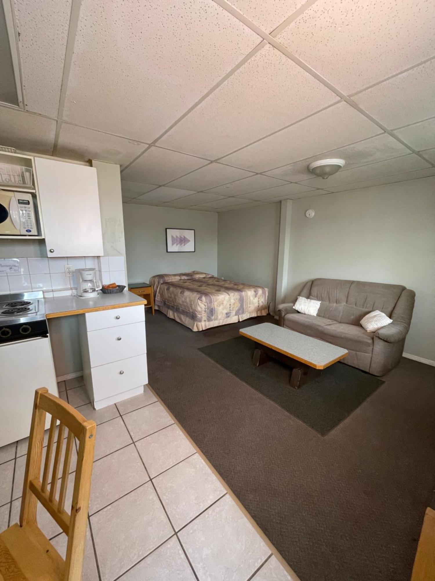 Raccoon Lodge Motel Sylvan Lake Buitenkant foto